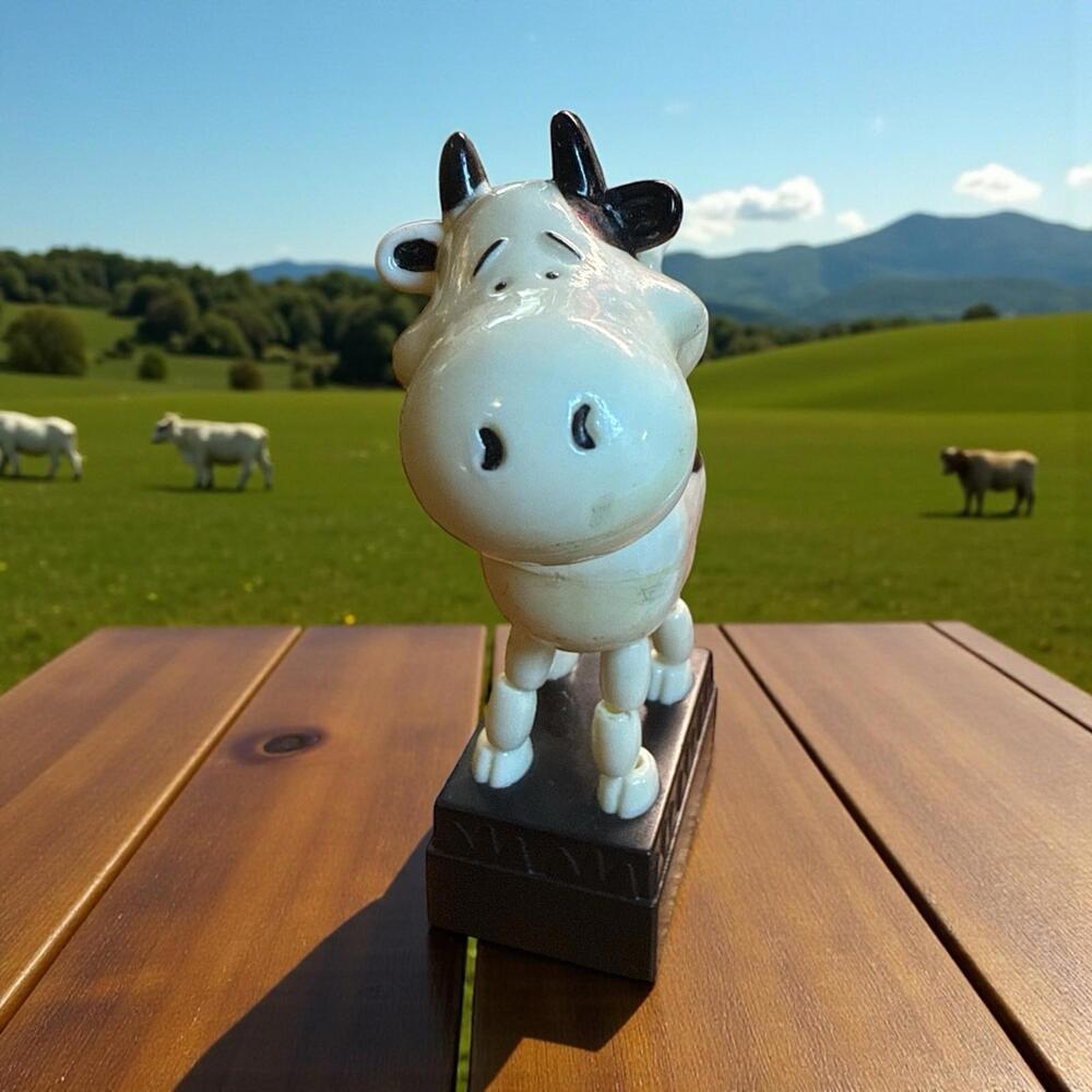 Vintage Push Button Thumb Puppet Cow Plastic Collapsible Toy 4 1/4 x 3 1/4 in